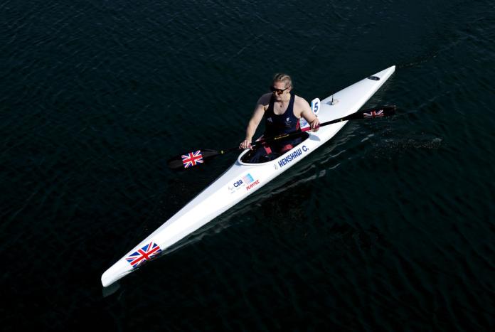 A female Para canoe athlete in action